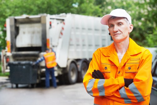 Builders removing construction waste in Wanstead